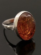 Sterling slv ring strrelse 56 med rav. 