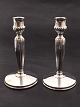 A pair of sterling silver candlesticks