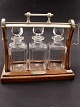 English tantalus with 3 carafes