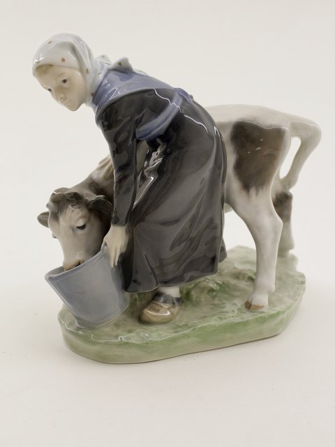 Royal Copenhagen girl with calf 779