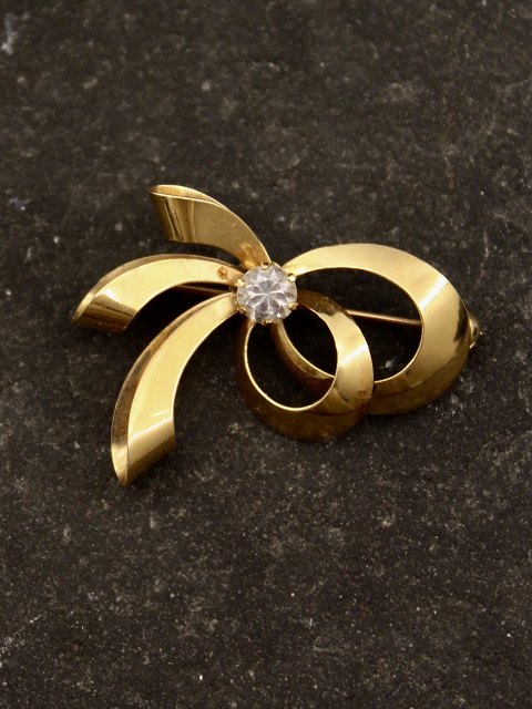 14 karat guld broche med zirkon