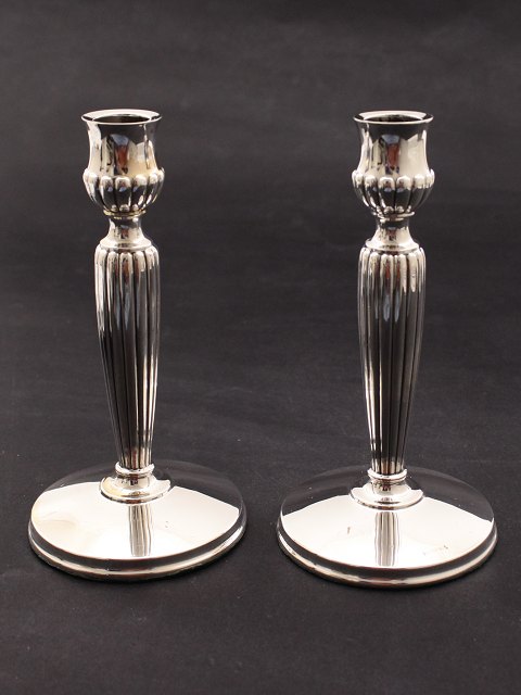 A pair of sterling silver candlesticks