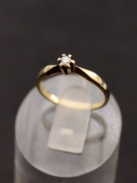 14 carat gold solitaire ring with diamond