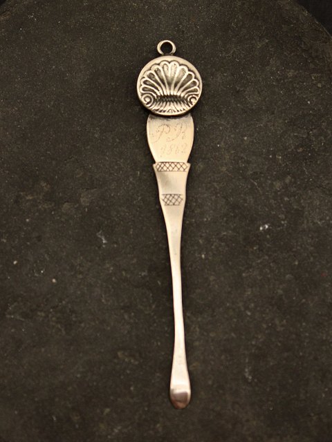 Silver pipe scraper