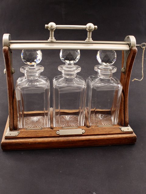 English tantalus with 3 carafes